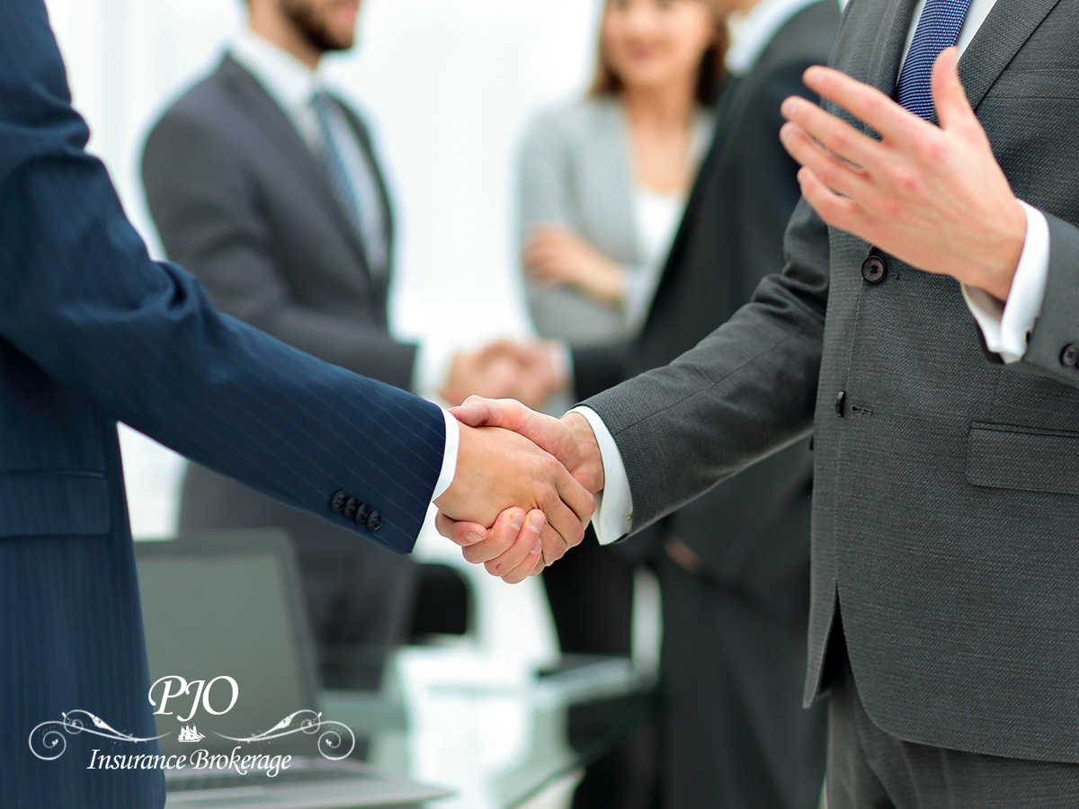 Entrepreneur Shaking Hands With A Professional Insurance Broker In Arizona